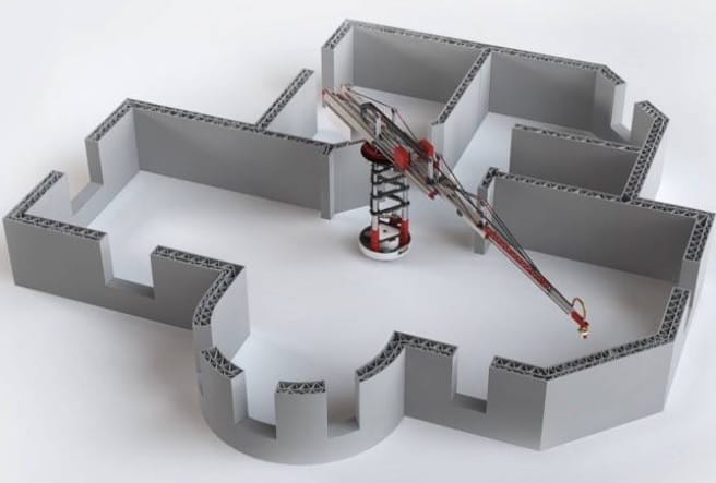 Ein 3D-Drucker im Zentrum eines teilweise gedruckten Hausgrundrisses auf weißem Hintergrund